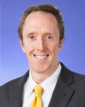 Bob Lonergan headshot, dressed in a suit and tie looking at the camera